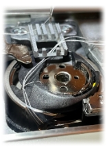 Close-up of spool and thread issue